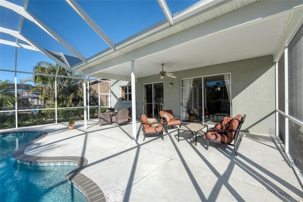 Oversized covered lanai space is perfect for friends and family