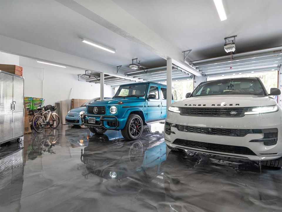 3-Car garage with metallic epoxy flooring.