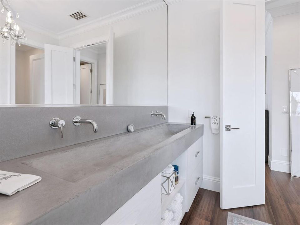 Custom designed one-piece concrete vanity.