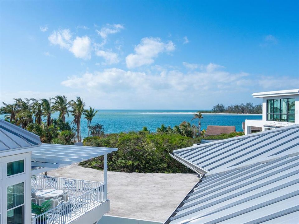 View of the Gulf of Mexico, Lido Key, and Big Pass from the top floor balcony.