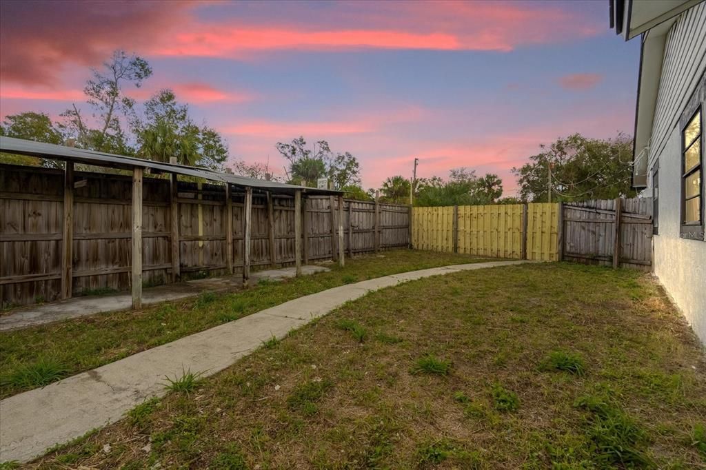 Fully Fenced Backyard with Storage Shed