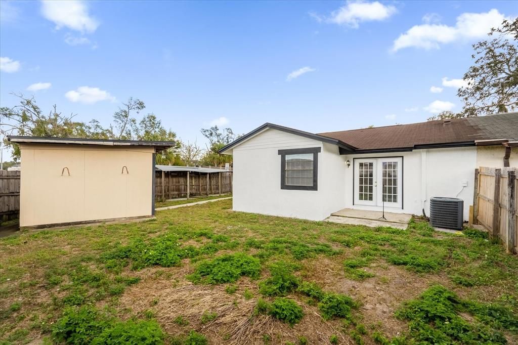 Fully Fenced Backyard with Storage Shed