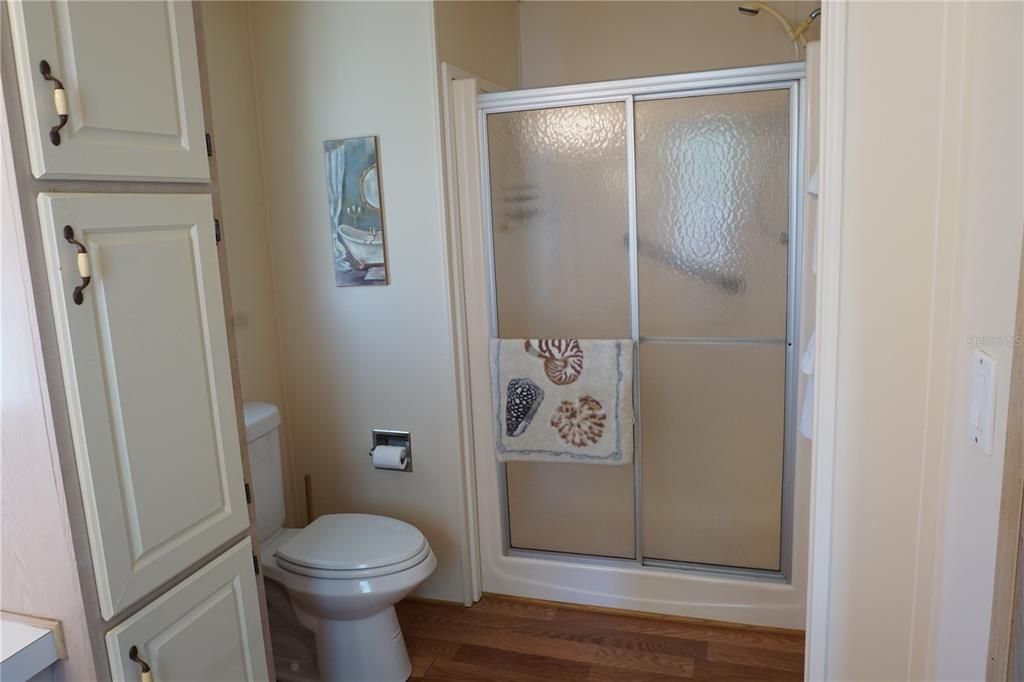 Primary ensuite bathroom with step-in shower