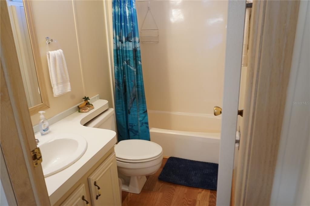 Guest bathroom with tub/shower combo