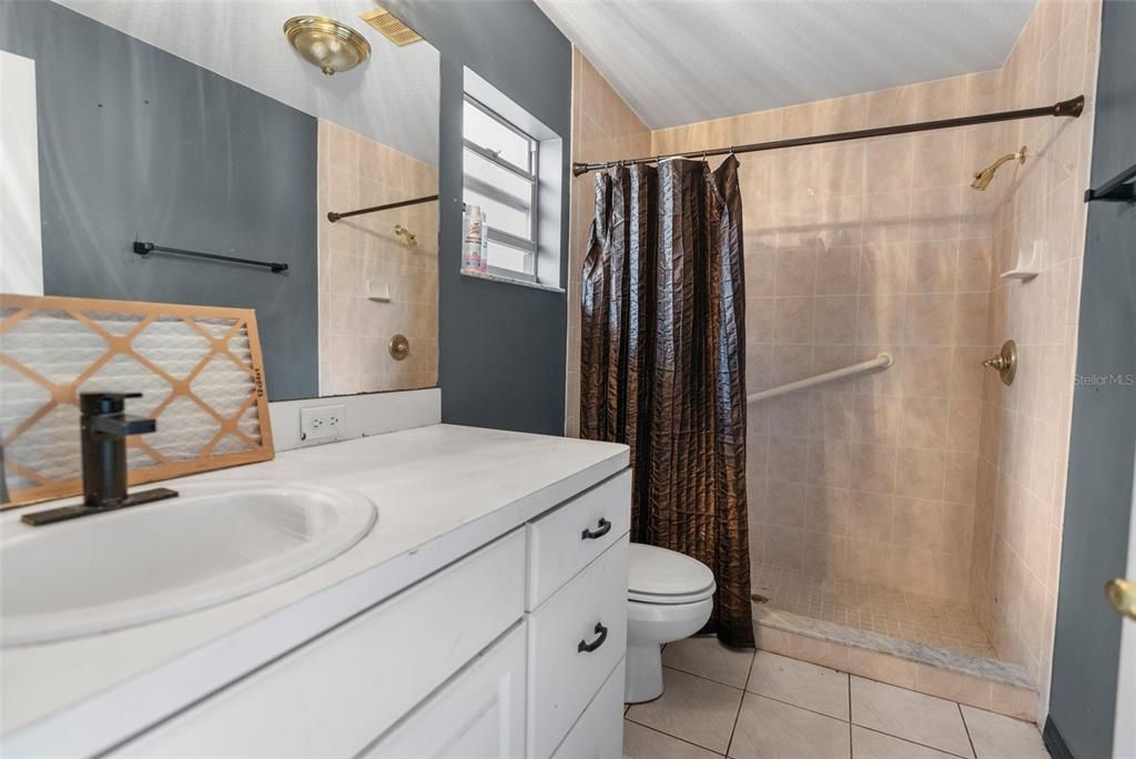 bathroom in detached Guest house. This makes 4 full baths for this property!