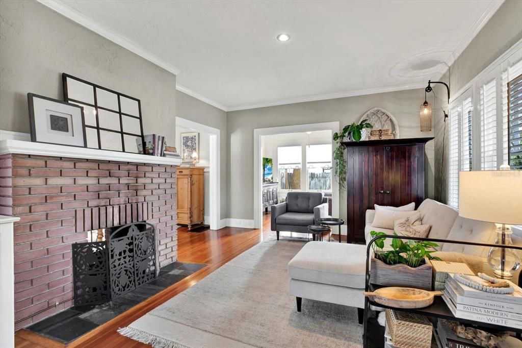 living room w/ view of two-sided fireplace