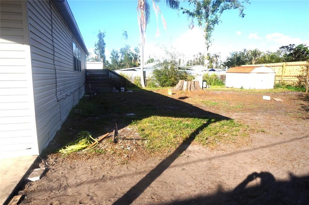 Backyard fully fenced in front and back