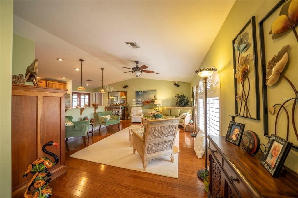 Living room with custom plantation shutters.