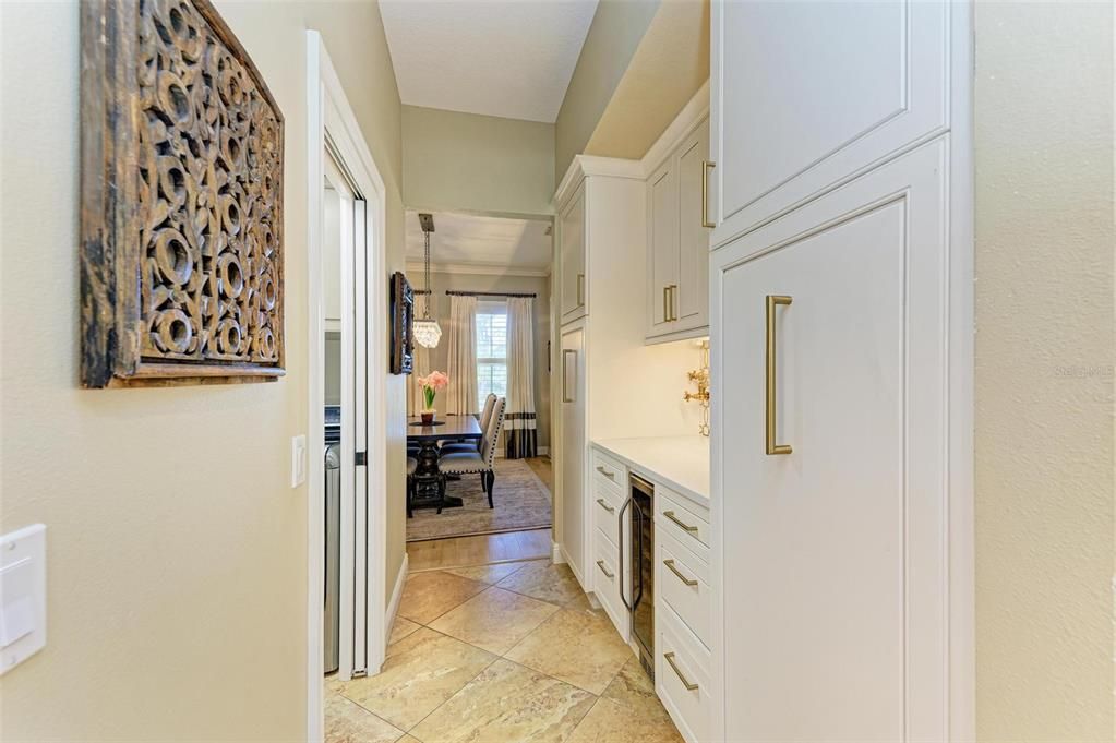 Custom cabinetry in kitchen, butlers pantry and laundry room.