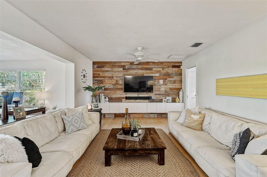 Living Room with custom built-in feature wall & cabinets