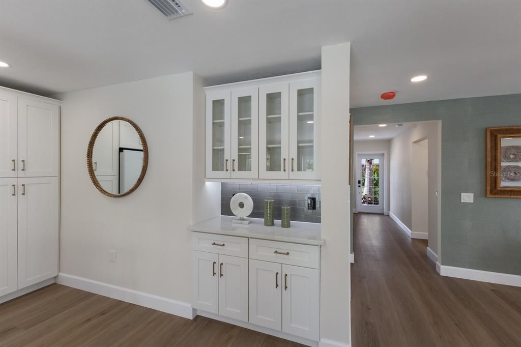 Coffee or dry bar area in the kitchen w/ extra cabinet and storage space