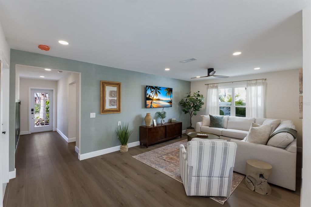 Living room w/ luxury vinyl flooring