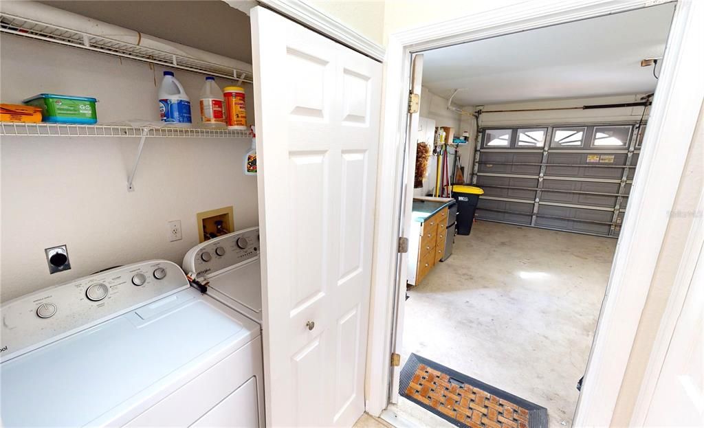 Laundry closet and garage off kitchen