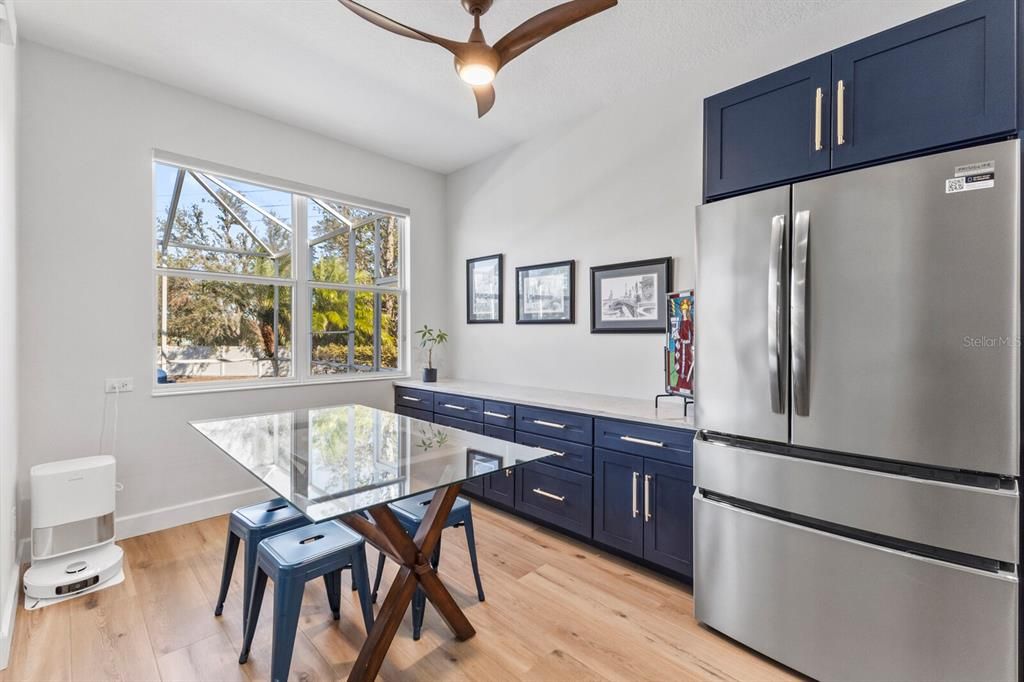 Eat in kitchen area with space for large table and built-ins