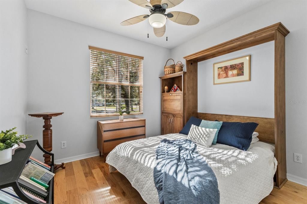 Bedroom 2 with murphy bed and built-in desk