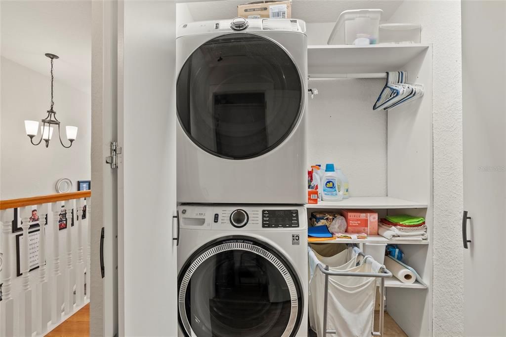 Laundry closet with a full-size washer and dryer is located in the hallway providing easy access to 4 of the 5 bedrooms.