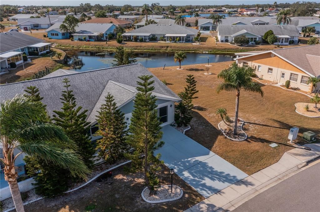 Water view and oversized lot split between the two homes.