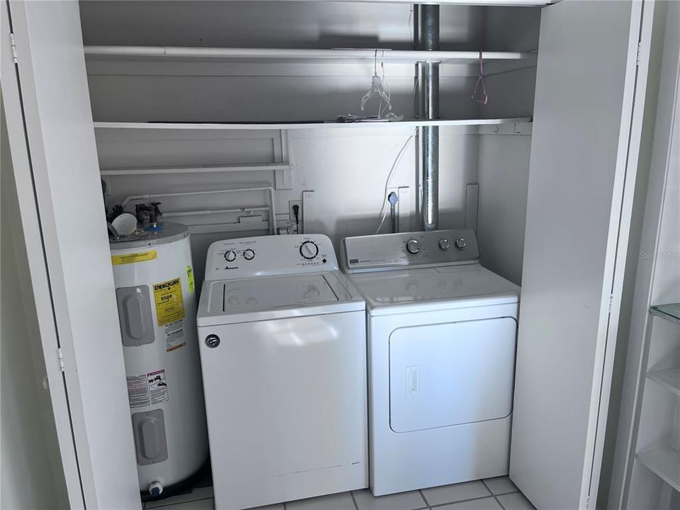 laundry closet near kitchen