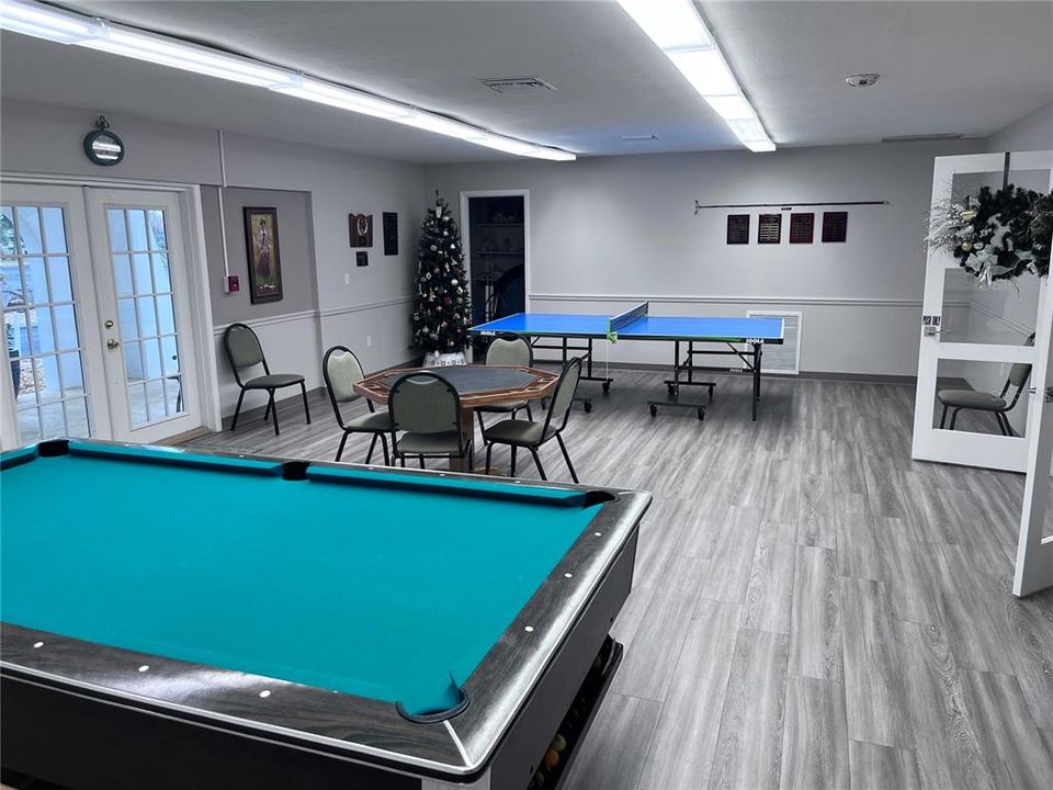 Billiards, ping pong and card table in rec hall