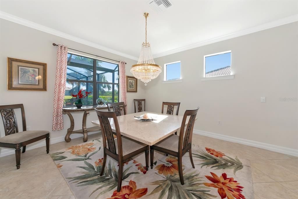 Classic Dining area with chadelier