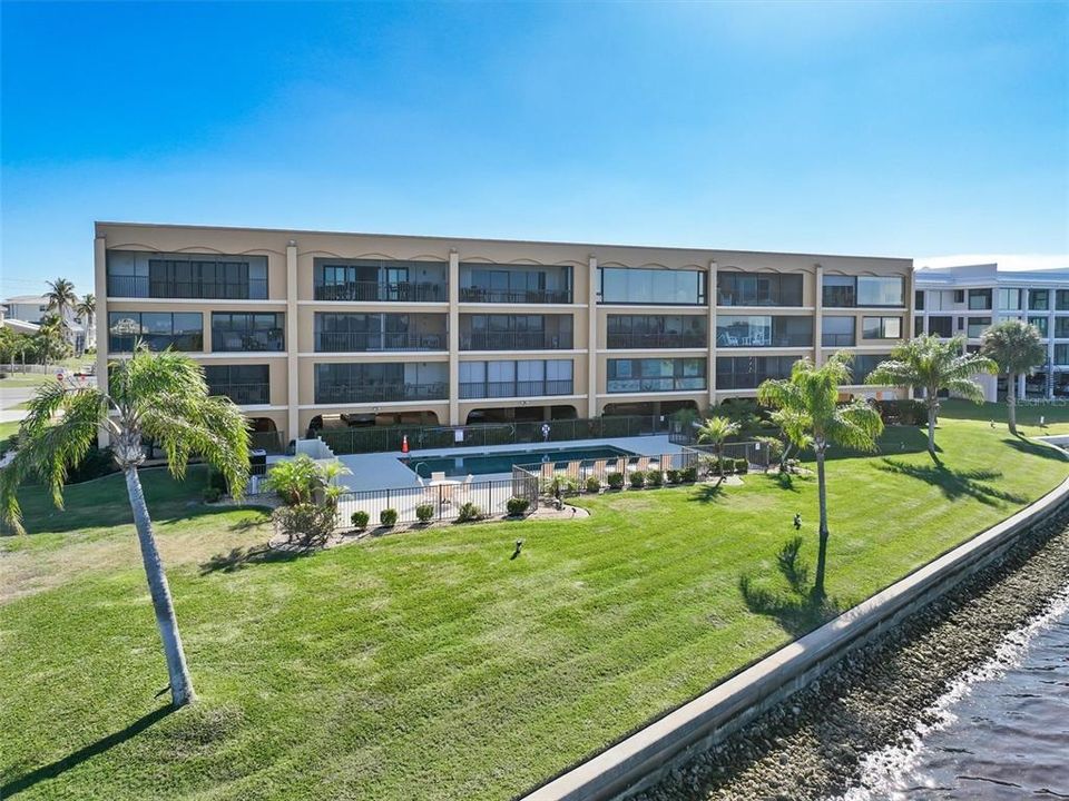 View from Harbor overlooking pool area and back of building