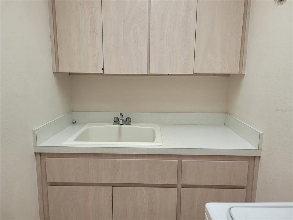 Laundry room with storage