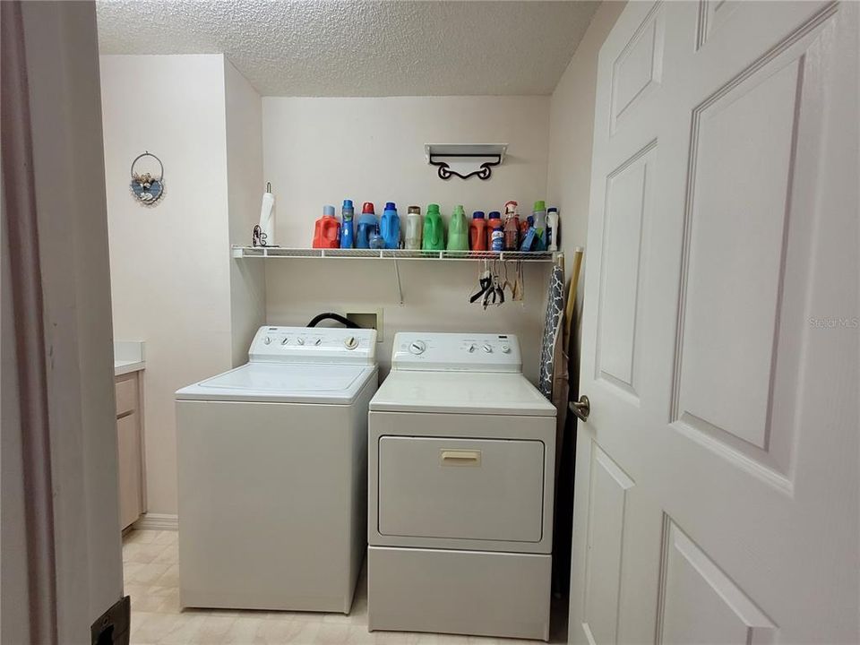 Laundry room with storage