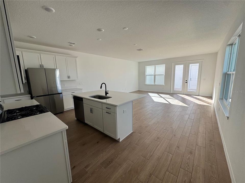 Living room and kitchen with an open concept