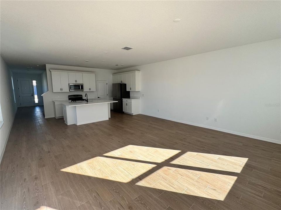 Living room and kitchen with an open concept