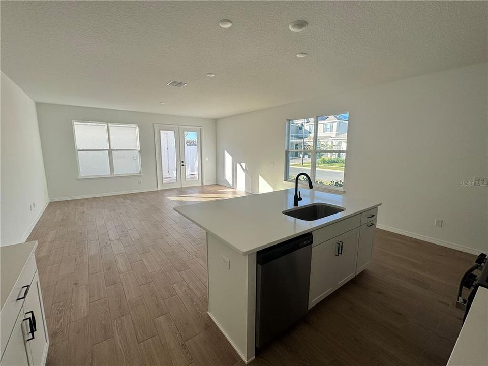 Living room and kitchen with an open concept