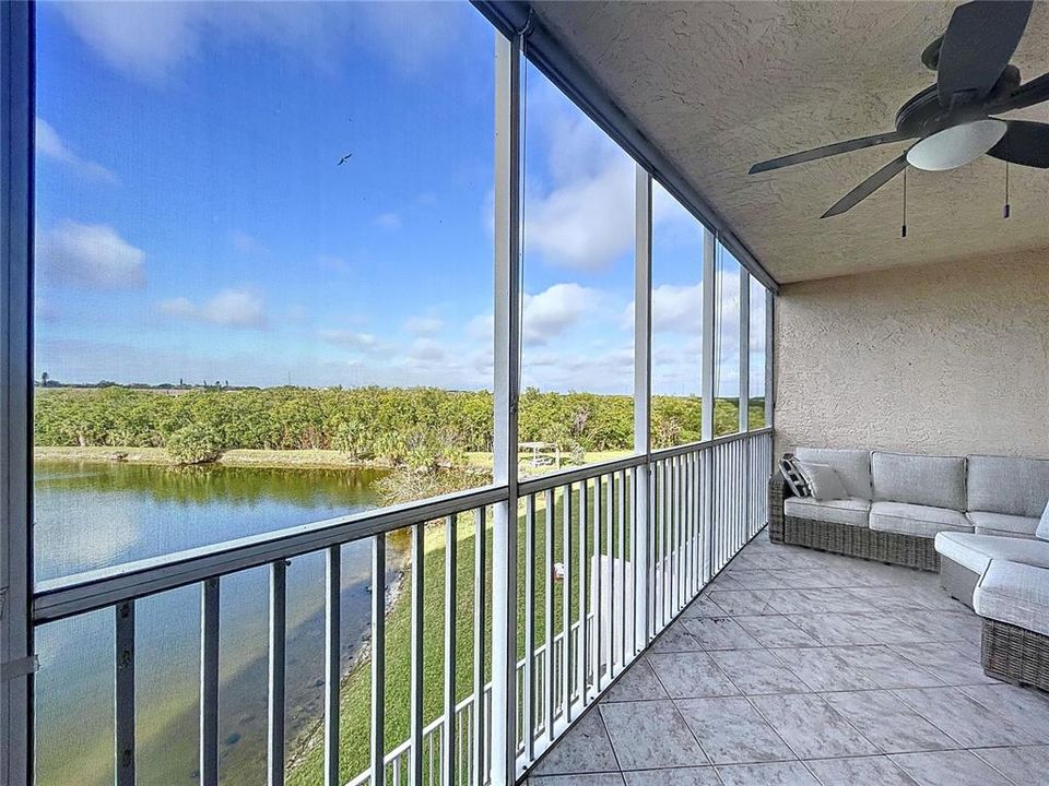 Waterfront scenery from your private screened balcony.  Enjoy evening cocktails and dinner while catching our amazing Florida sunsets.