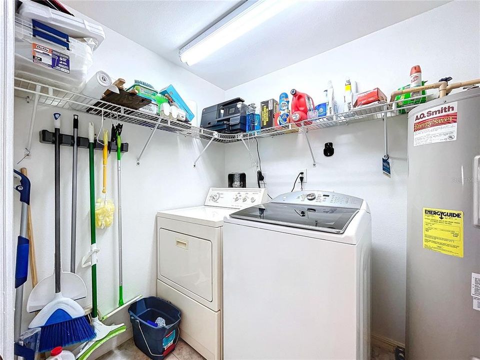 In-unit laundry room is convenient and offers additional storage space.