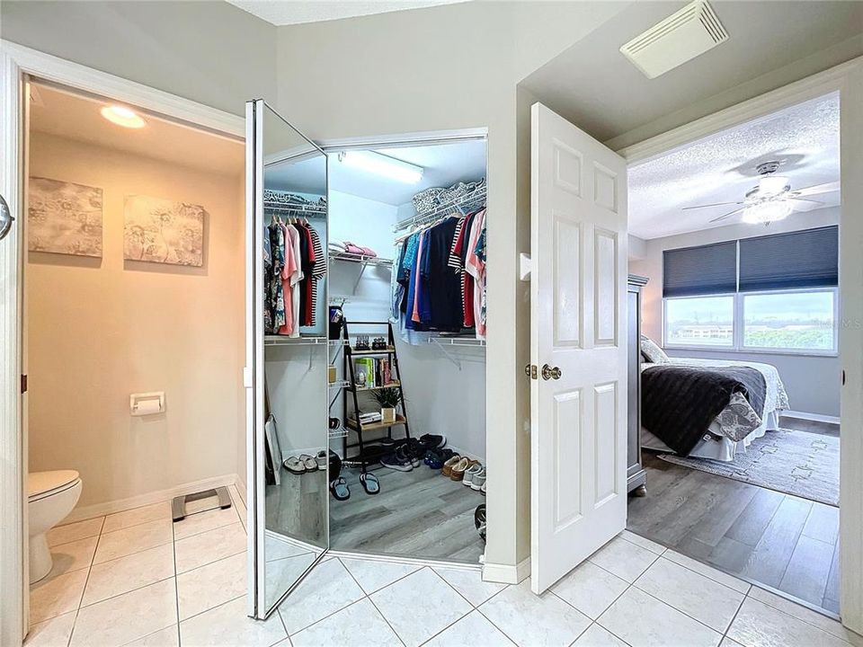 The Primary bathroom offers dual sinks, separate water closet, two walk-in closets and shower with glass door.