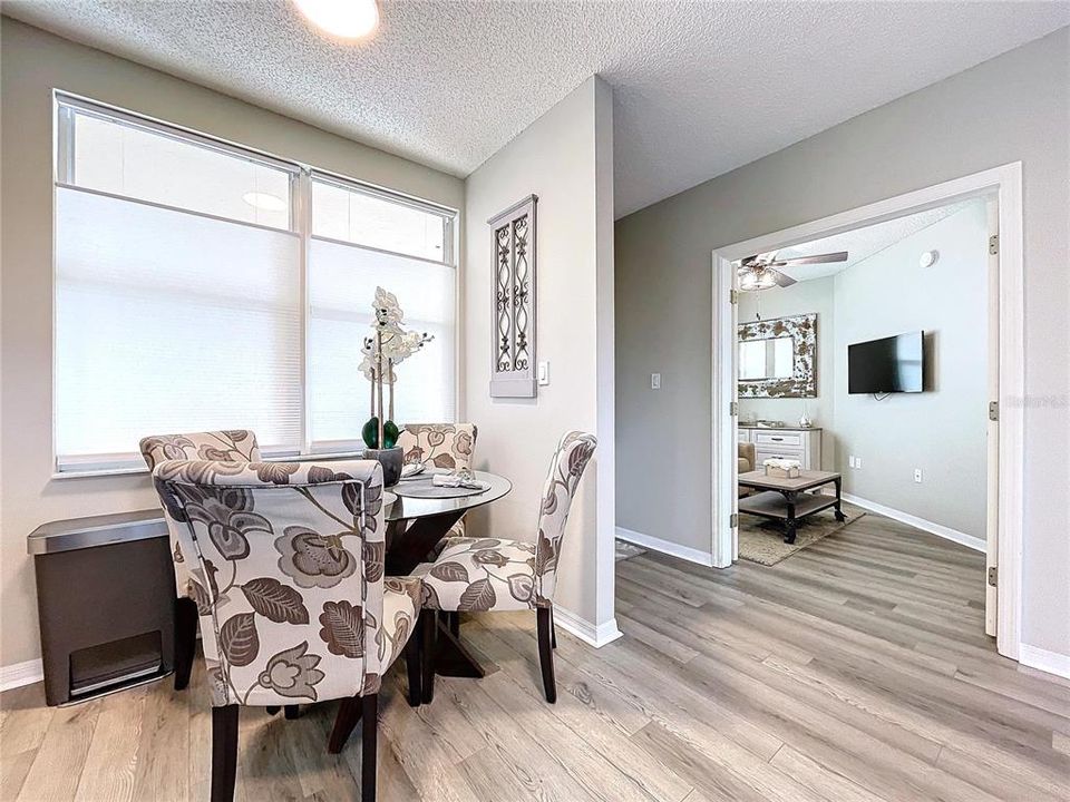 Kitchen features a closet pantry and breakfast table space.