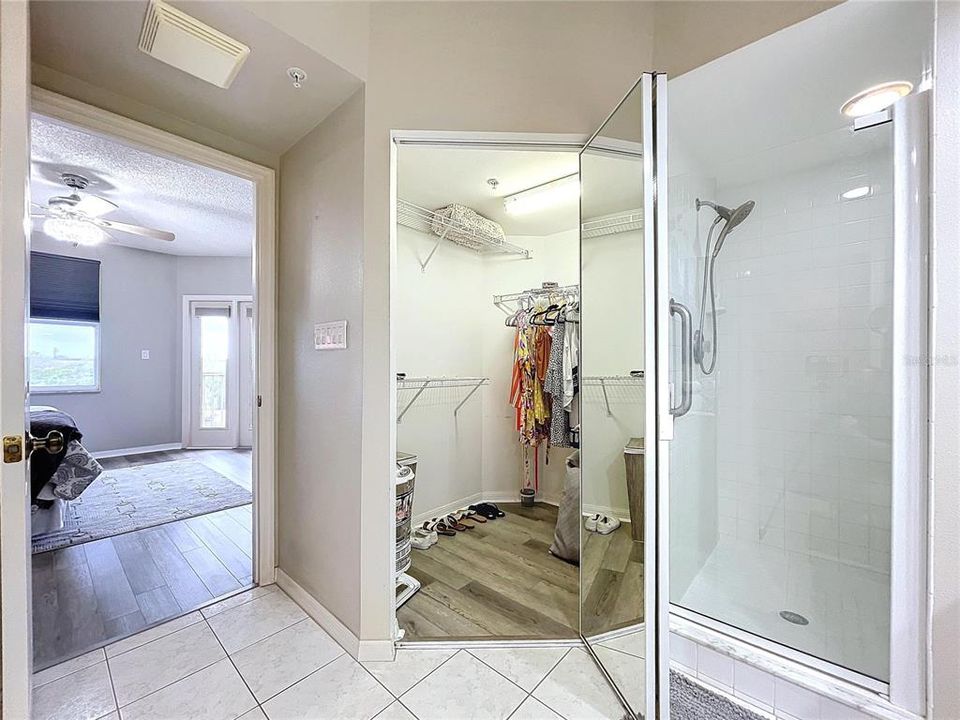 The Primary bathroom offers dual sinks, separate water closet, two walk-in closets and shower with glass door.