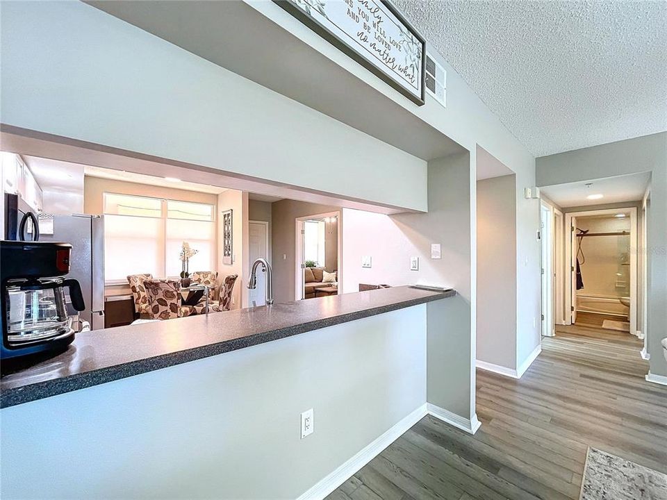 Use the open kitchen for barstools and additional sitting space to entertain.