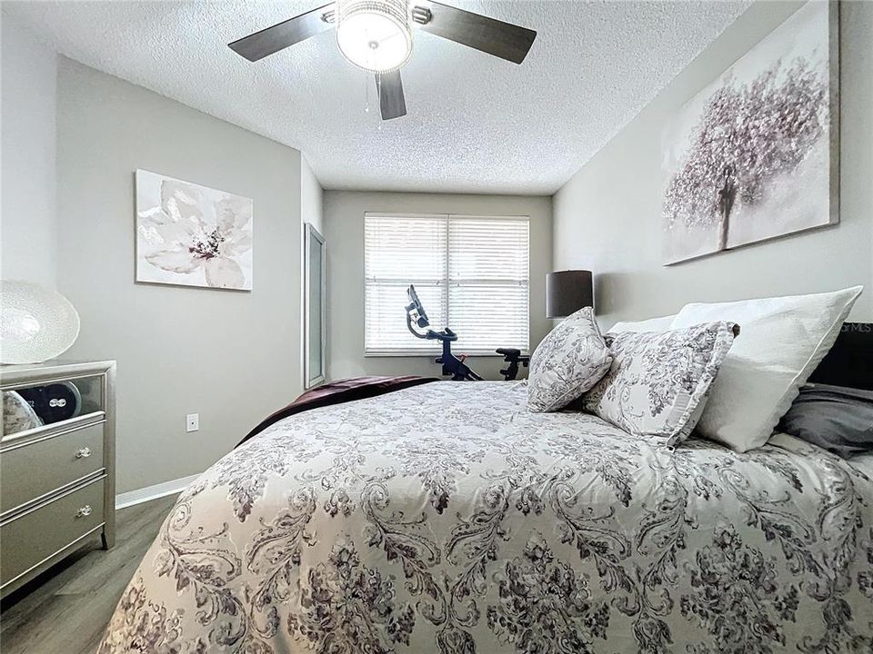 The 2nd bedroom also offers natural lighting and LVT flooring.