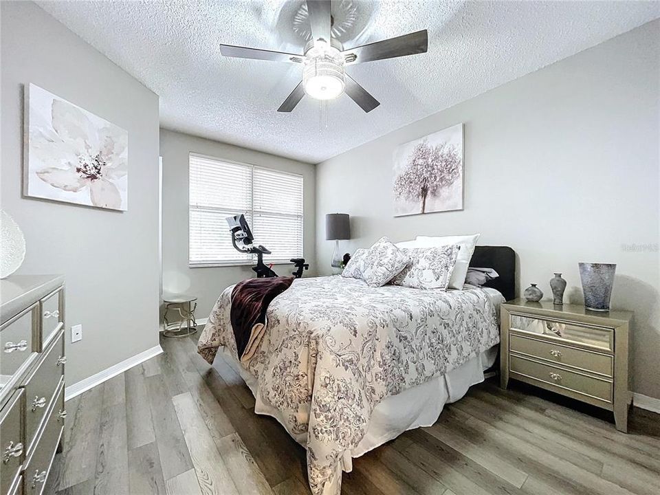 The 2nd bedroom also offers natural lighting and LVT flooring.