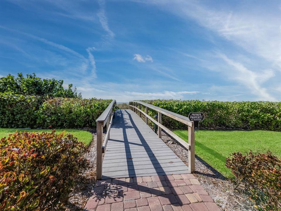 a scenic path guides you to your exclusive deeded beach access.