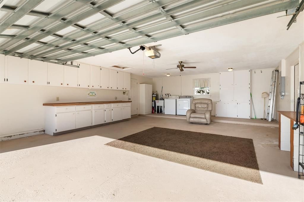 Over Sized 2 Car Garage With Storage and Cabinets