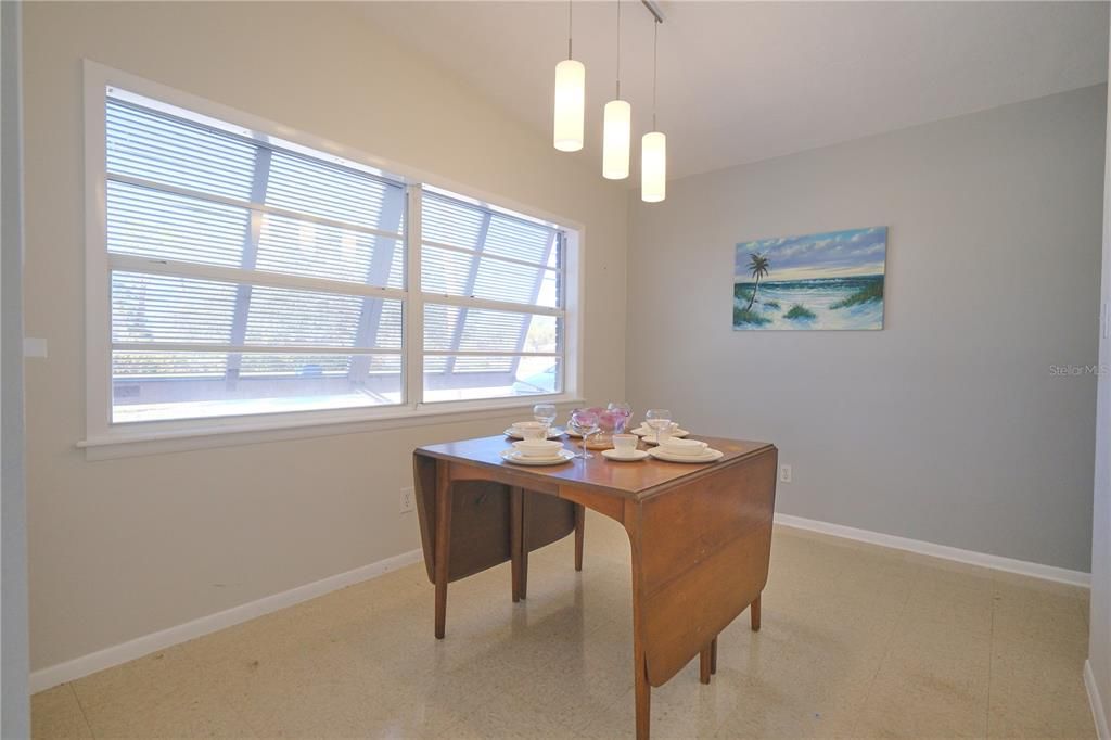 Huge windows and French doors make the home!