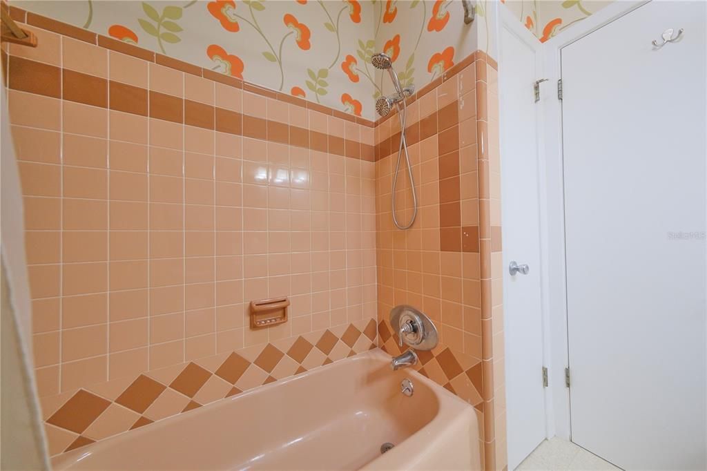 Guest bathroom - well maintained and awaits your touch