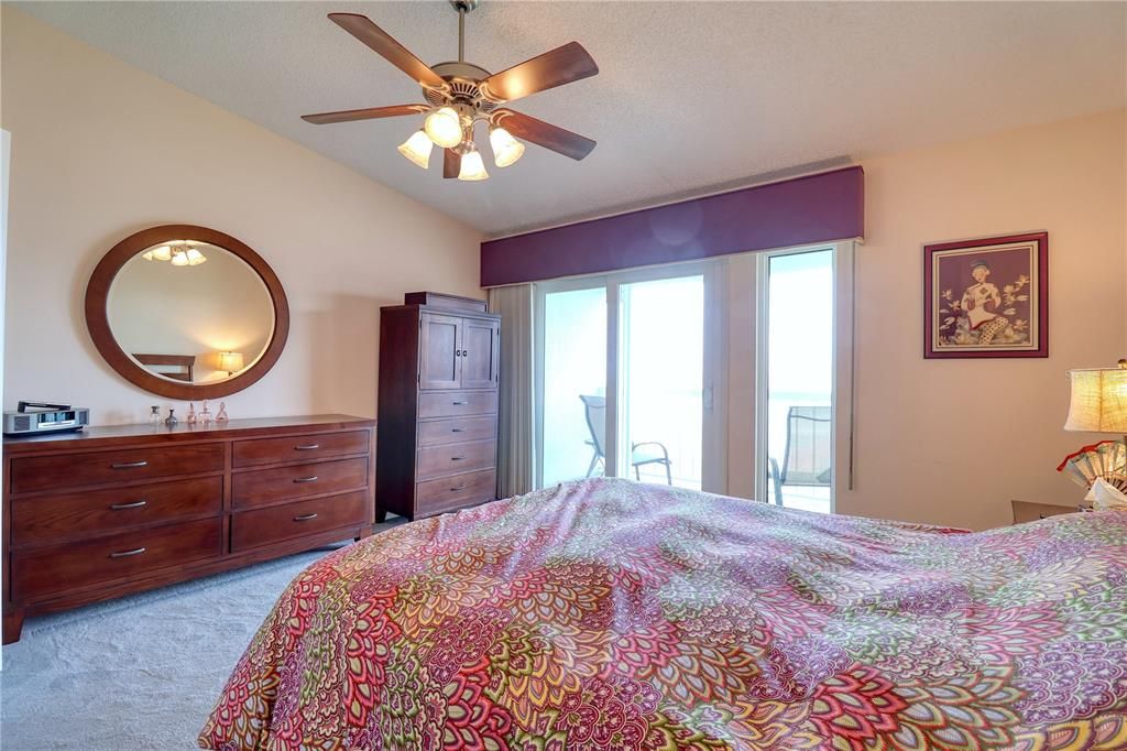 Primary bedroom with balcony