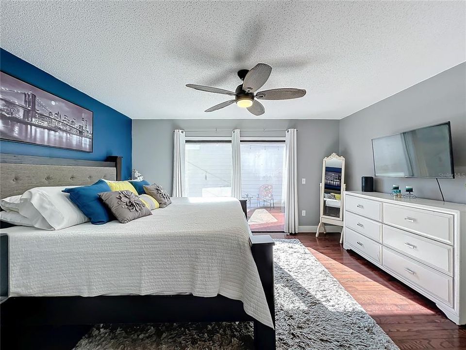 Primary Bedroom with Sliding Door to Side Patio