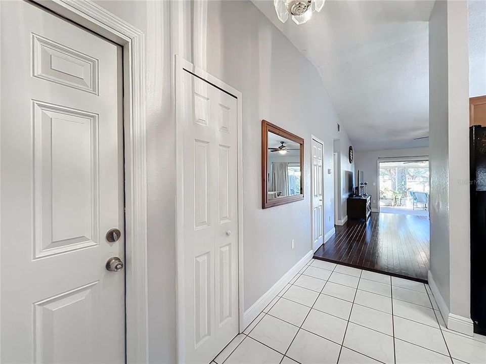 Entrance Hallway with door to Garage and Two Storage Closets