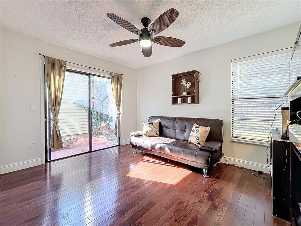 Bedroom 1 with Sliding Door to Side Patio