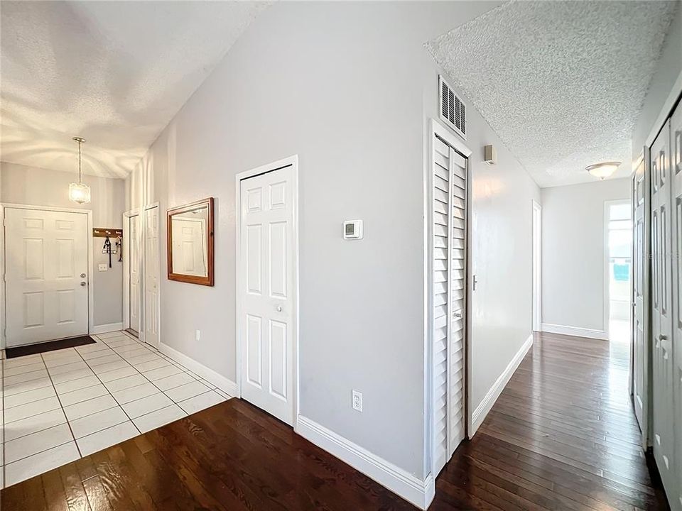 Hallway to Bedrooms with Two More Storage Closets