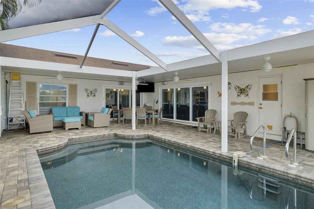 Spacious pool deck area and four fans to keep those hot days cool