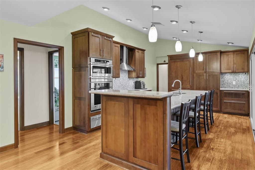 View of kitchen with access to other bedrooms and bathrooms.