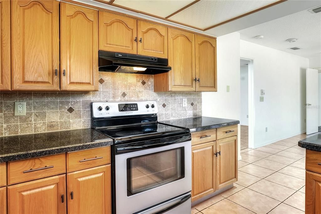 More storage, more  counter with a view into the adjacent dining room